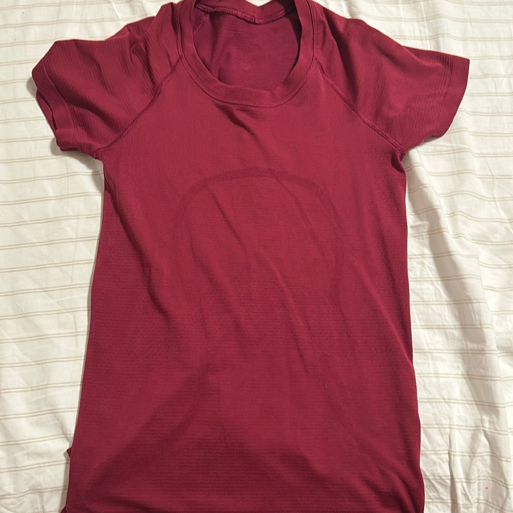 Pink/red lulu Swiftly Tech, Size 2. Great condition.